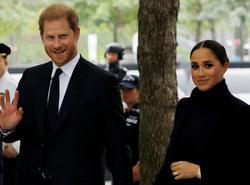 Britain's Prince Harry and Meghan, Duke and Duchess of Sussex, visit the 9/11 Memorial in Manhattan, New York City