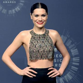 Singer Jessie J poses backstage during the 2014 MTV Video Music Awards in Inglewood