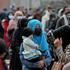 Packages from a Turkish humanitarian aid group distributed amongst Afghans in Kabul