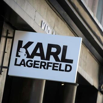 FILE PHOTO: A sign and logo are seen on the Karl Lagerfeld store in New York, U.S.