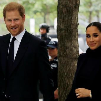 Britain's Prince Harry and Meghan, Duke and Duchess of Sussex, visit the 9/11 Memorial in Manhattan, New York City