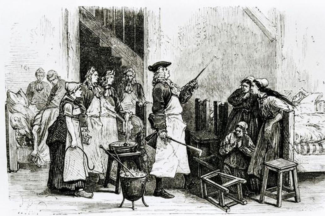 Hermann Boerhaave treating hysteria
Hysteria treatment. Engraving of the treatment used to cure hysteria by the Dutch physician Hermann Boerhaave (1668-1738). Boerhaave (at centre) found that people suffering from hysteria (as seen here) could be calmed by making them frightened and so began threatening them with red- hot pokers. Boerhaave took a pioneering, mechanistic view of the human body and was an excellent lecturer, taking his students to patients' beds & so founded clinical teaching. The word "hysteria" comes from a Greek word for uterus and was incorrectly thought to be a physical disorder affecting only women. Image of Boerhaave at work in a hospital in Leiden during 1710.