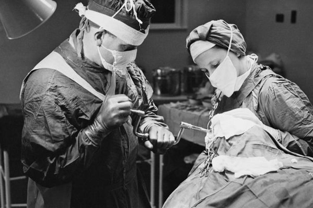 Lobotomy Procedure
A surgeon using a brace and bit to drill into a patient's skull before performing a lobotomy, at a mental hospital in England, November 1946. Original publication: Picture Post - 4254 - Life In A Mental Hospital - pub. 23rd November 1946 (Photo by Kurt Hutton/Picture Post/Hulton Archive/Getty Images)