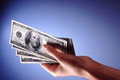 Ruka s dolary