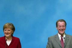 Merkelová a Müntefering oznamují uzavření koaliční dohody