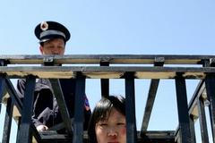 Falun Gong - protest v Bruselu