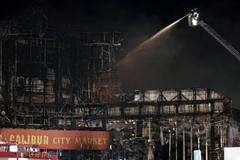 Požár tržnice v Hatích