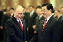Ruský prezident Vladimír Putin a jeho čínský protivník Chu Ťin-tchao