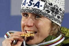 Kateřina Neumannová se zlatou medailí