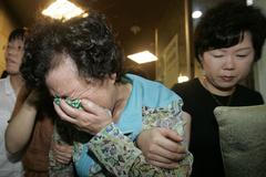 Matka zabitého Šim Sung-mina