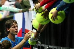 Tomáš Berdych se podepisuje fanouškům