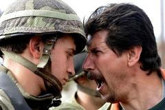 Palestinec a izraelský voják