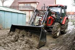 Traktor v blátě
