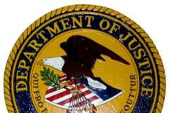 Znak amerického ministerstva spravedlnosti.