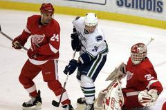 Dva veteráni: Dominik Hašek a Chris Chelios