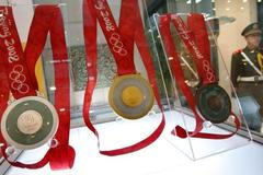 Představování pekingských olympijských medailí