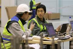 Pracující cizinci. Ilustrační foto