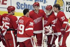 Chris Osgood a Dominik Hašek