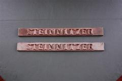 Nová a stará jmenovka na náhrobcích v Terezíně