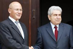 Prezidenti Christofias a Talat po schůzce v Nikósii