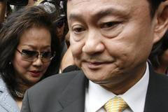 Thaksin Shinawatra a jeho choť Potjaman
