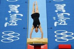 Trénink gymnastů v Pekingu