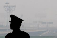 Peking zahalený do smogu