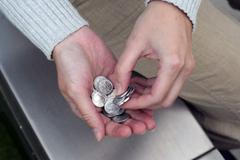 Mince v hrsti - peníze