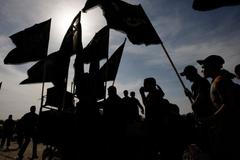 Procesí šíitských poutníků v Bagdádu