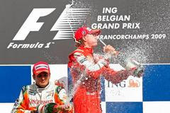 Kimi Räikkönen Giancarlo Fisichella se radují z úspěchu na Velké ceně Belgie