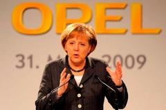 Angela Merkelová v centrále Opelu v Ruesselsheimu