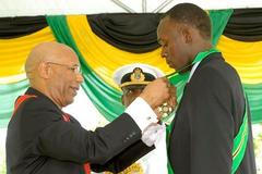 Usain Bolt při předávání