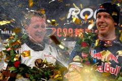 Schumachewr a Vettel slaví triumf v Pekingu