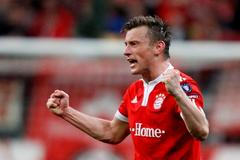 Ivica Olič se raduje z branky v síti Manchesteru