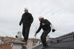 Kominíci při práci