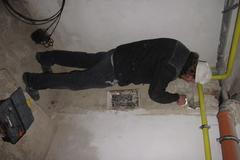 Kominíci při práci