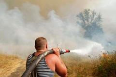 Geroj Putin osobně vyrazil bojovat s plameny