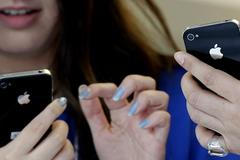 Začátek prodeje nového iPhone 4S v japonském Tokiu