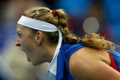 Česká tenistka Petra Kvitová slaví vítězství ve finále Fed Cupu 2011 proti Rusku.