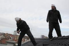 Kominíci při práci