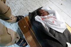 Muammar Kaddáfí po smrti v chladničce