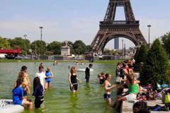 Fotky zpocené Evropy: Horko udeřilo na Paříž i Tyroly