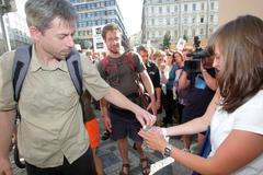 Demonstrace proti bourání domu na Václavském náměstí.