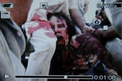 Fotografie raněného Kaddáfího