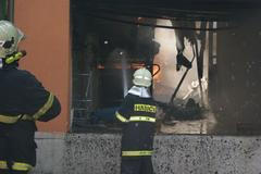 Požář šicí dílny