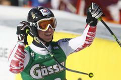 Rakušan Hannes Reichelt se raduje z vítězství