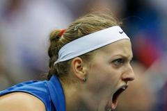 Česká tenistka Petra Kvitová slaví vítězství ve finále Fed Cupu 2011 proti Rusku.