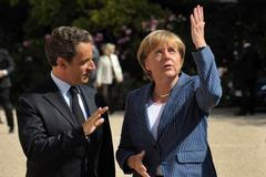 Francouzský prezident Nicolas Sarkozy při vítání německé kancléřky Angely Merkelové