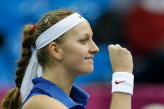 Česká tenistka Petra Kvitová slaví vítězství ve finále Fed Cupu 2011 proti Rusku.