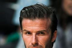 Celebrity na basketbalovém zápase fandí Los Angeles Lakers - David Beckham